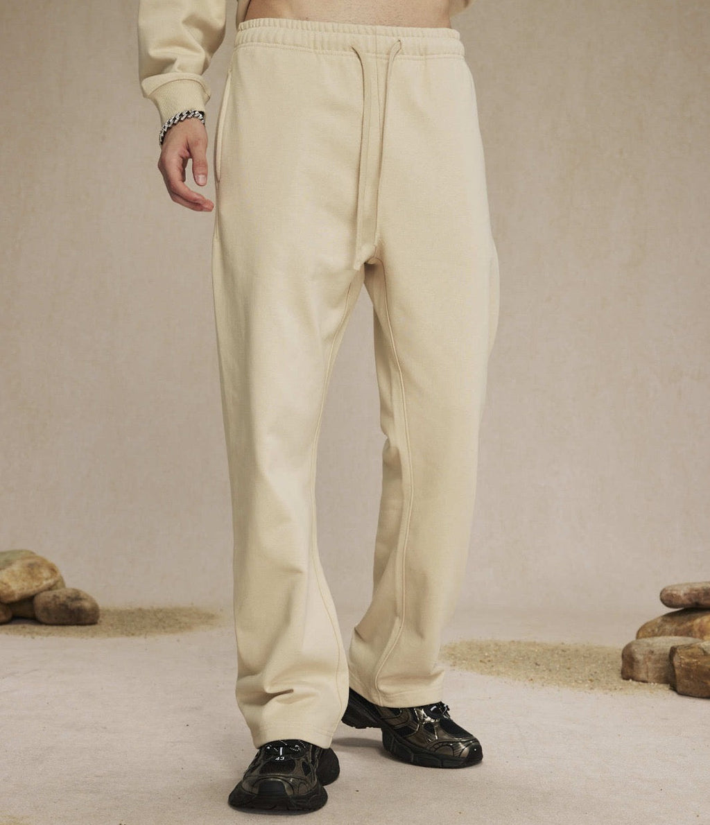 LOOSE CREAM SWEATPANTS